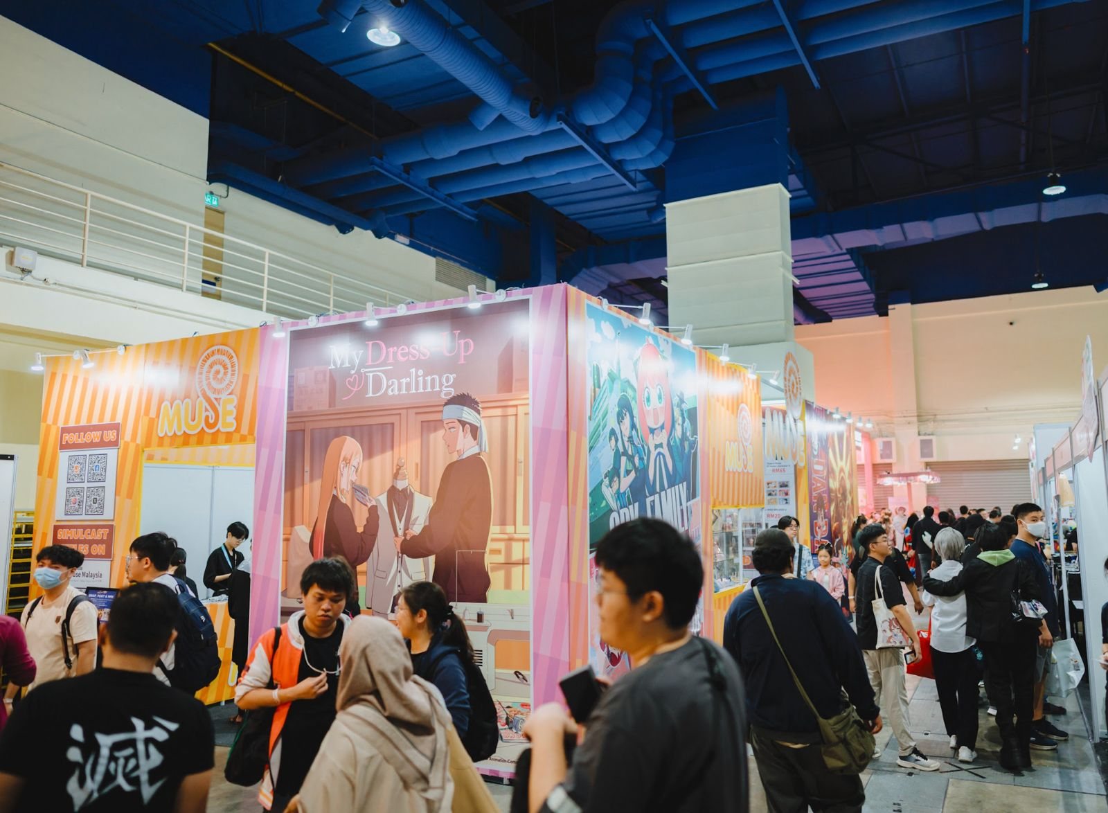 Branded event booth with visitors